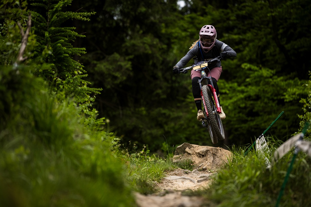 Ella racing down the track in Poland