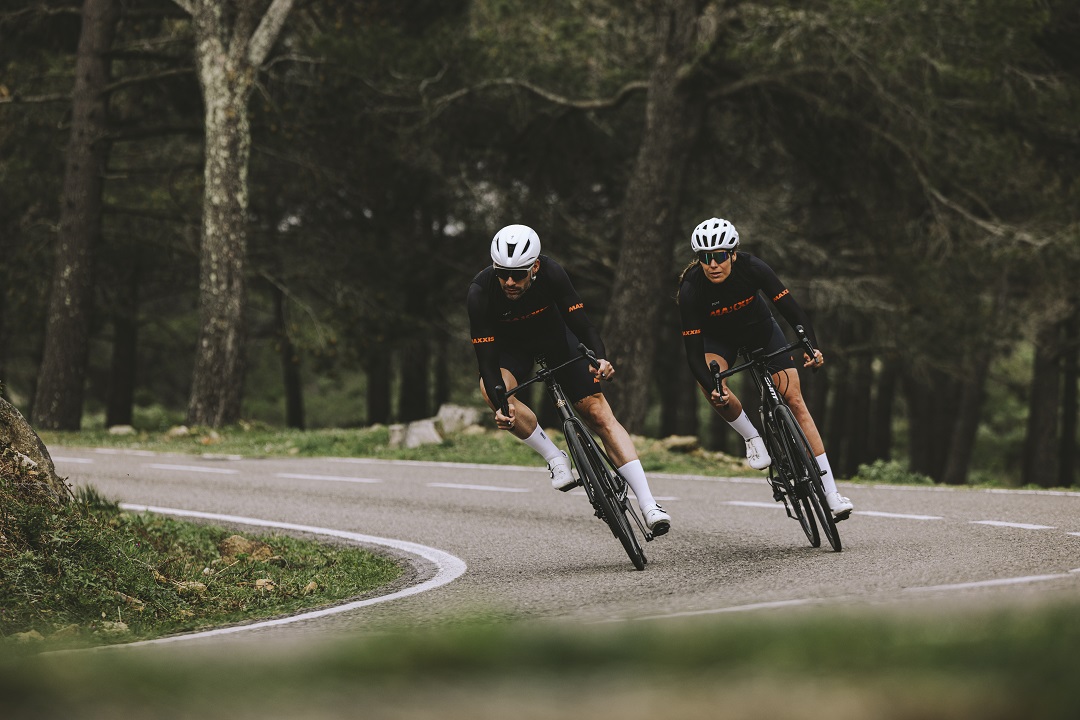 Road riders rounding a bend